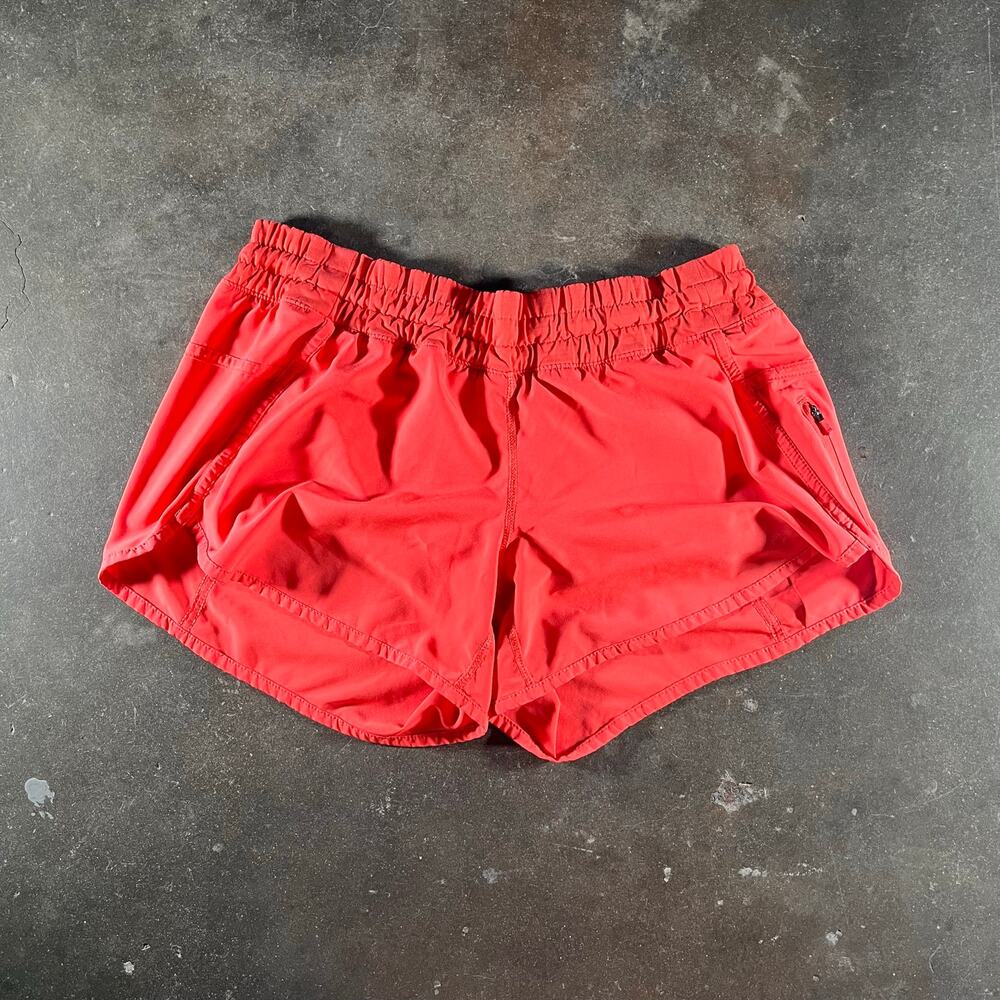 Modern casual women’s orange lululemon athletic short shorts size 4